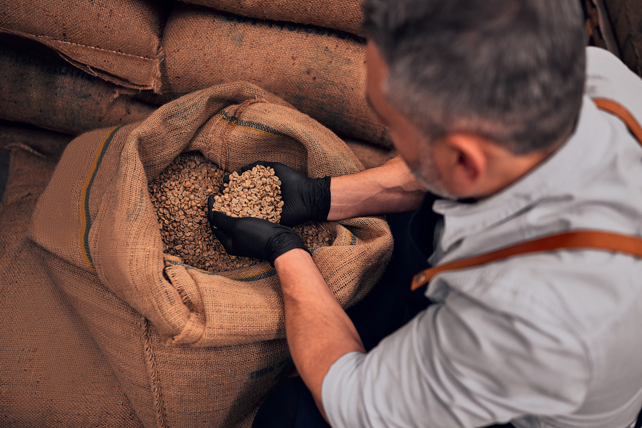 Man with sacks of nuts